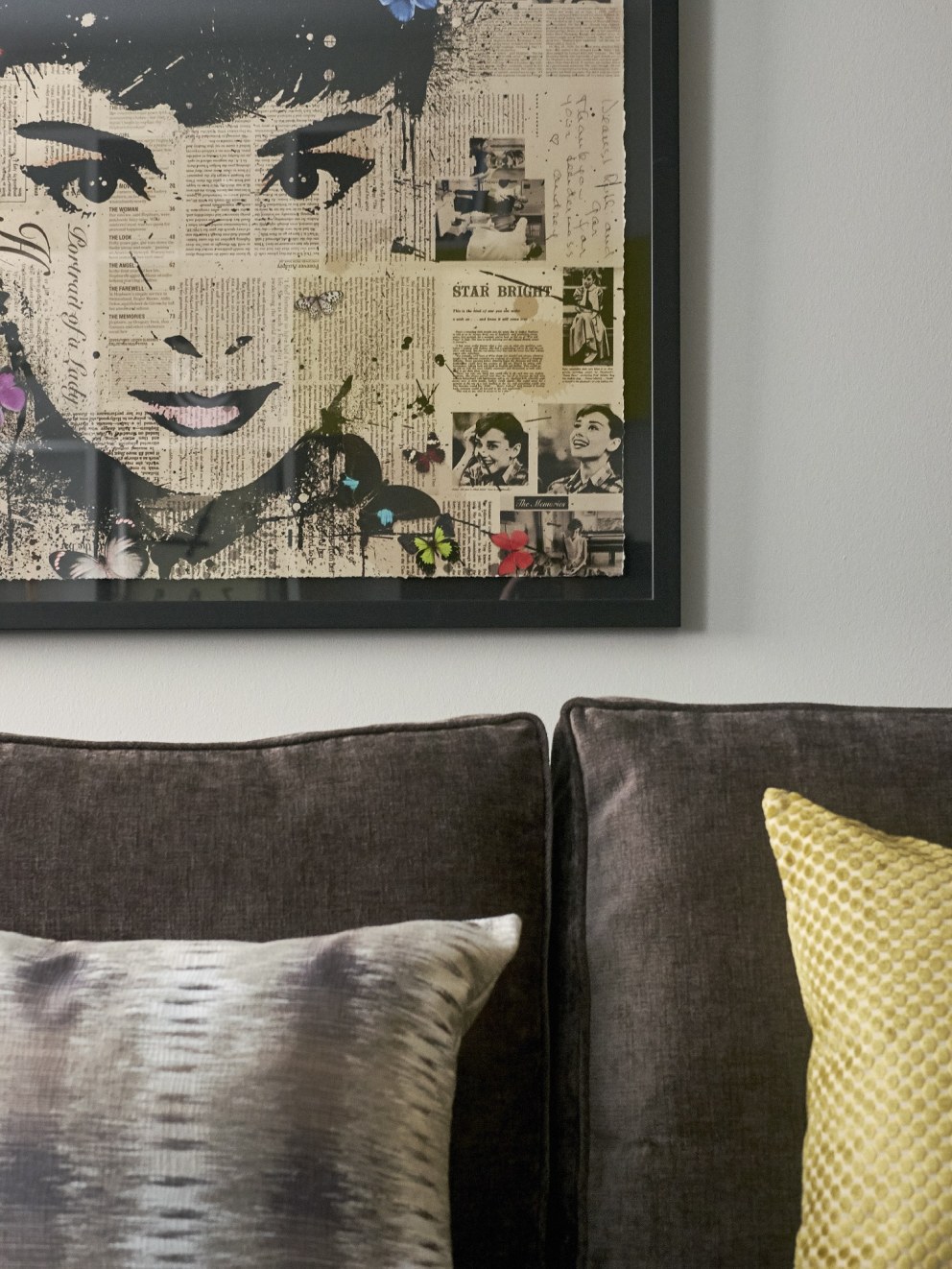 Apartment in the city  | Detail of bespoke sofa, cushions and striking artwork  | Interior Designers